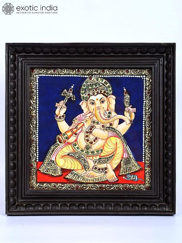 exotic india Lord Ganesha Playing Shehnai | 24 Karat Gold Work | Framed Tanjore Painting 
