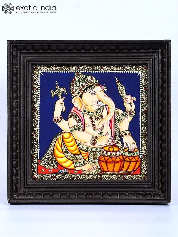 exotic india Lord Ganesha Playing Tabla | 24 Karat Gold Work | Framed Tanjore Painting 