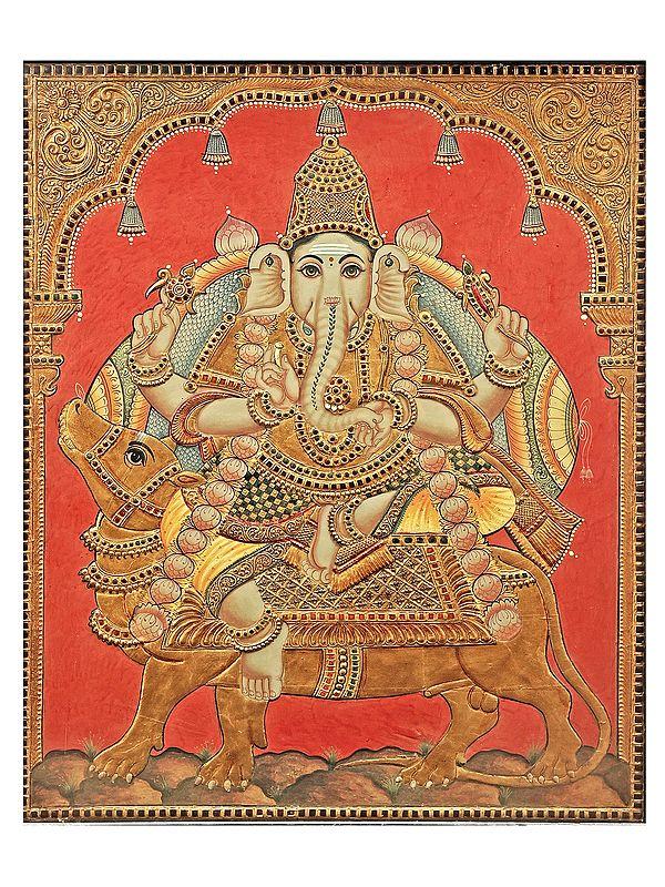Exotic India Lord Ganesha Seated On A Rat Tanjore Painting | Traditional Colors With 24K Gold | Teakwood Frame | Gold & Wood | Handmade | Made In India
