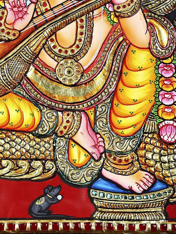 Exotic India Lord Ganesha Seated On Peacock Throne | 24 Karat Gold Work | Framed Tanjore Painting 