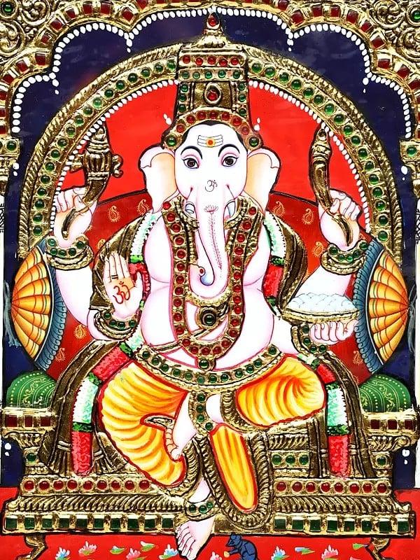 Exotic India Lord Ganesha Seated On Throne | 24 Karat Gold Work | Framed Tanjore Painting 