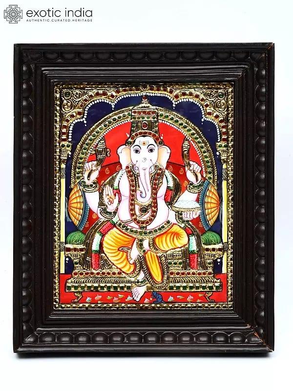 exotic india Lord Ganesha Seated on Throne | 24 Karat Gold Work | Framed Tanjore Painting 