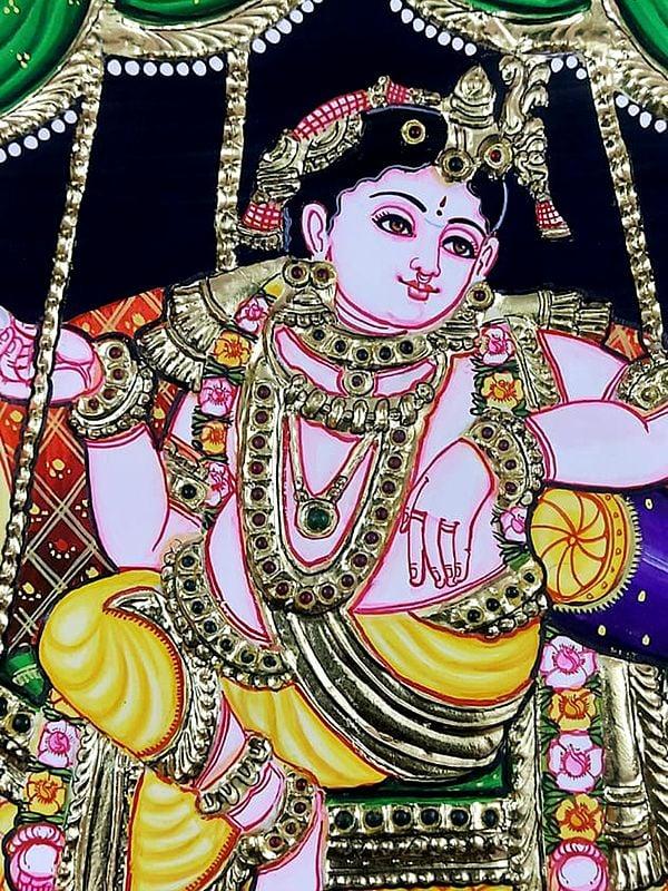 Exotic India Lord Krishna Seated On Swing | Tanjore Painting | Traditional Colors With Gold Work