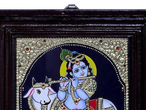 Exotic India Lord Krishna With Cow | Traditional Colors With 24K Gold | Teakwood Frame | Gold & Wood | Handmade