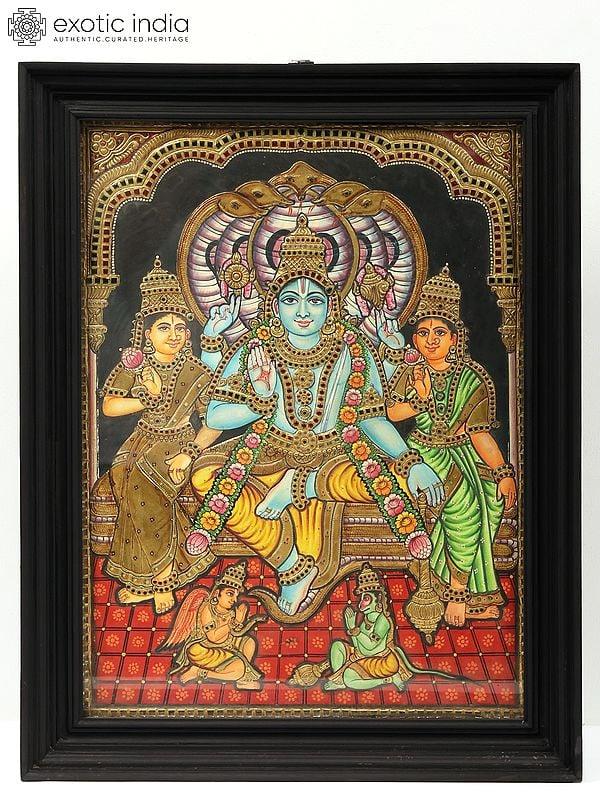 exotic india Lord Vishnu with Bhu Devi and Shri Devi - Tanjore Painting with Frame | Traditional Colors with Gold Work 