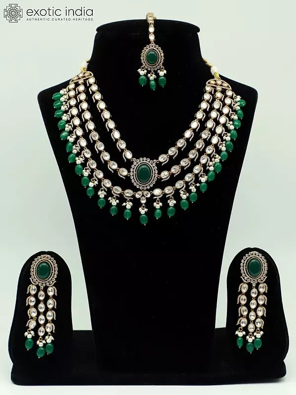 exotic india Monalisa Beads Triple Layer Stone Studded Necklace With Earrings And Mangtika 