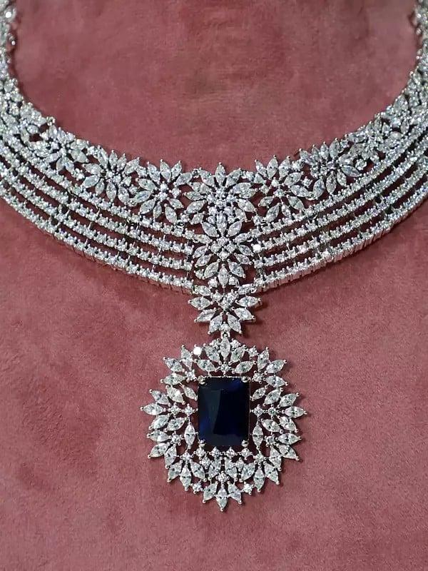 Exotic India Multi Layered Floral Design Stone Studded American Diamond Necklace Set With Earrings