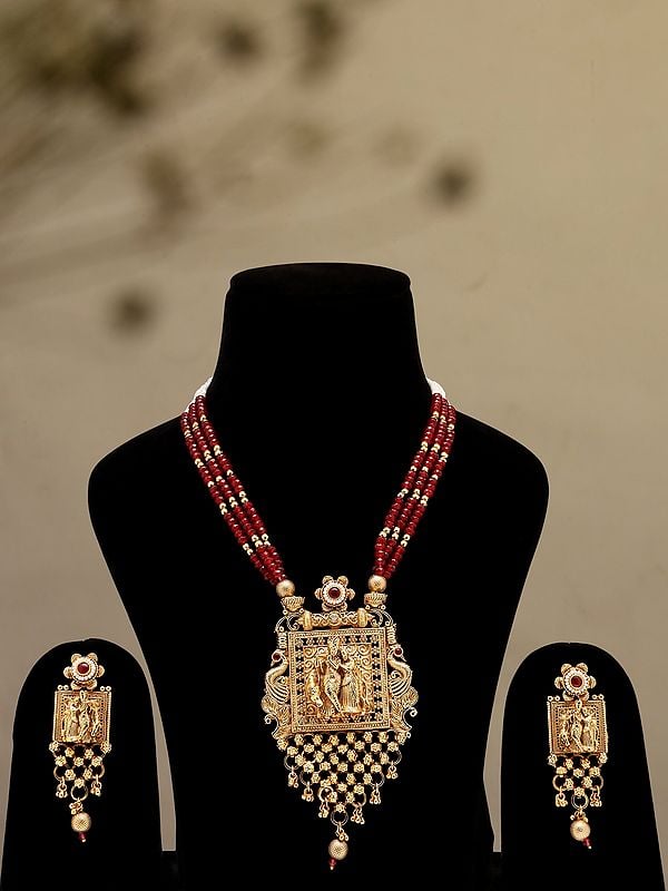 exotic india Multi Strand Radha Krishna Long Necklace & Earrings Set 