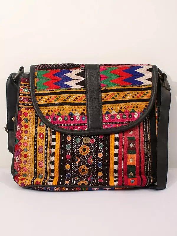 exotic india Multicolor Sequins-Mirror Work Boho Cross Bag with All-Over Antique Rabari Embroidery 
