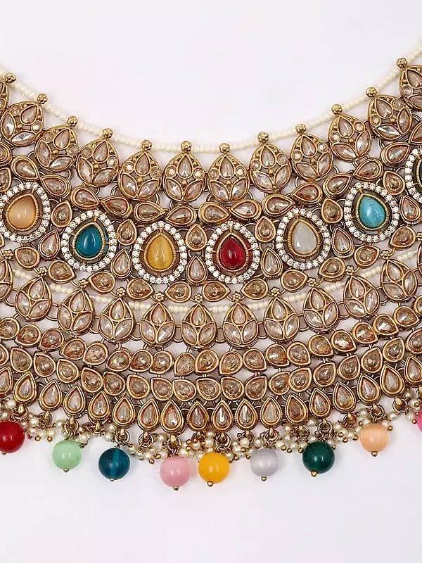Exotic India Multicolor Stone Studded Choker Necklace Set With Earrings And Mangtika 