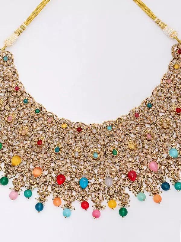 Exotic India Multicolor Stone Studded Choker Necklace Set With Earrings And Mangtika