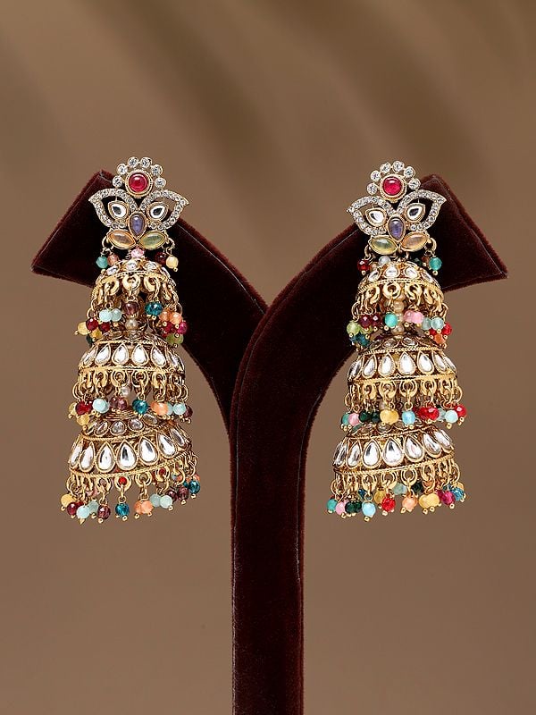 Exotic India Multicolor Stone Studded Dome Shaped Triple Layer Jhumka 