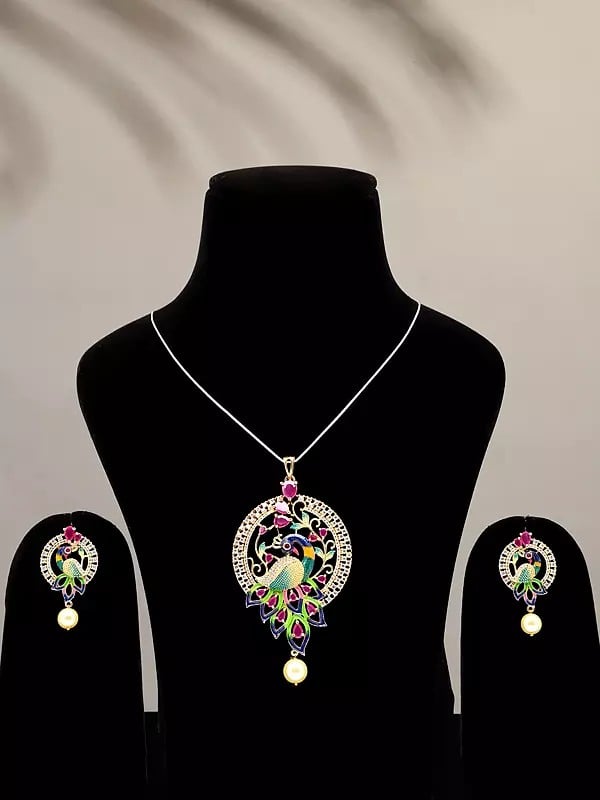 exotic india Multicolor Stone Studded Peacock Pendant and Earrings Set with Pearl Drop 