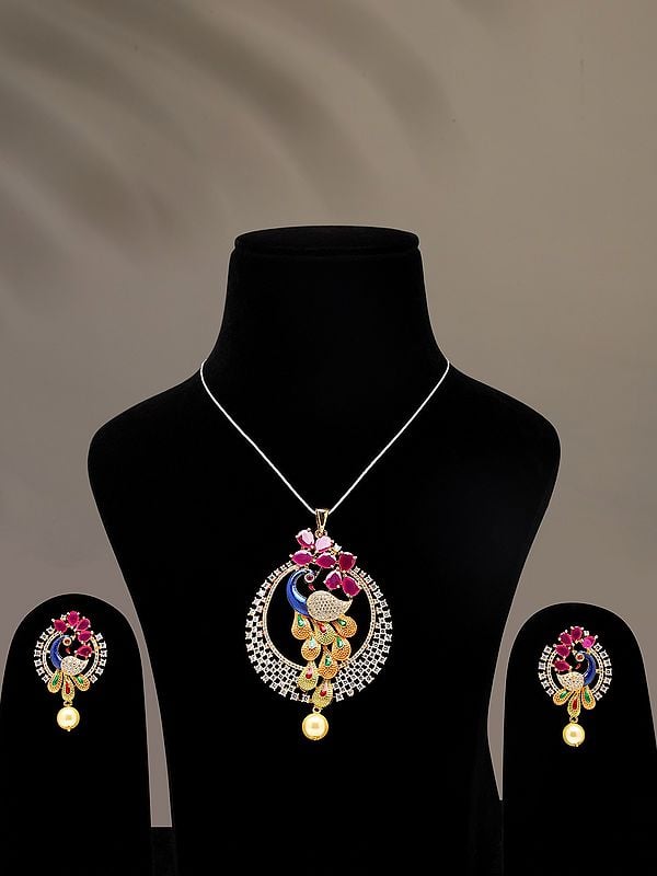 exotic india Multicolor Stone Studded Peacock Pendant and Earrings Set with Pearl Drop 