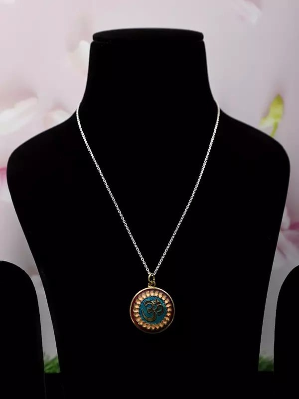 exotic india Om Design Round Shape Pendant in Brass 