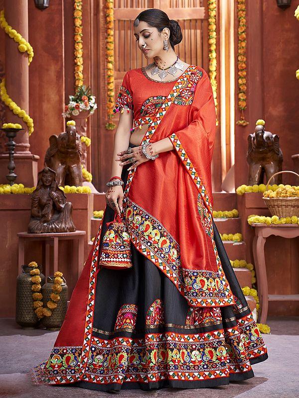 Exotic India Orange-Black Beautiful Traditional Lehenga Choli And Dupatta With Attractive Border Lace And Mirror Hand Work 