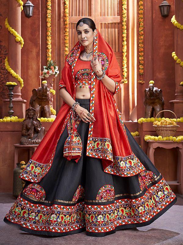 exotic india Orange-Black Beautiful Traditional Lehenga Choli And Dupatta With Attractive Border Lace And Mirror Hand Work 