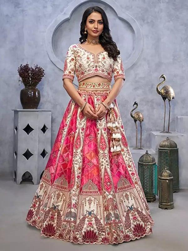 Exotic India Organza Silk Temple And Peacock Motifs Bandhej Jacquard Patches Lehenga Choli With Soft Net Dupatta