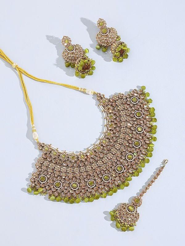 exotic india Padmavati Stone Studded and Beaded Choker Necklace Set with Earrings and Mangtika 