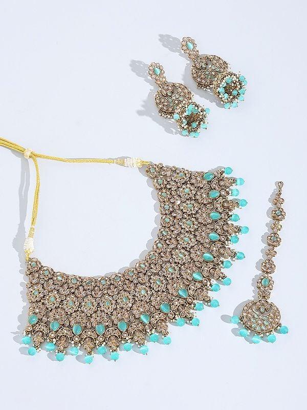 exotic india Padmavati Stone Studded Choker Necklace Set with Earrings and Mangtika 