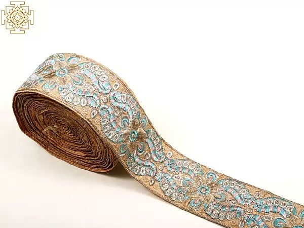Exotic India Peach Border With Multicolor Silver-Zari Thread Work 
