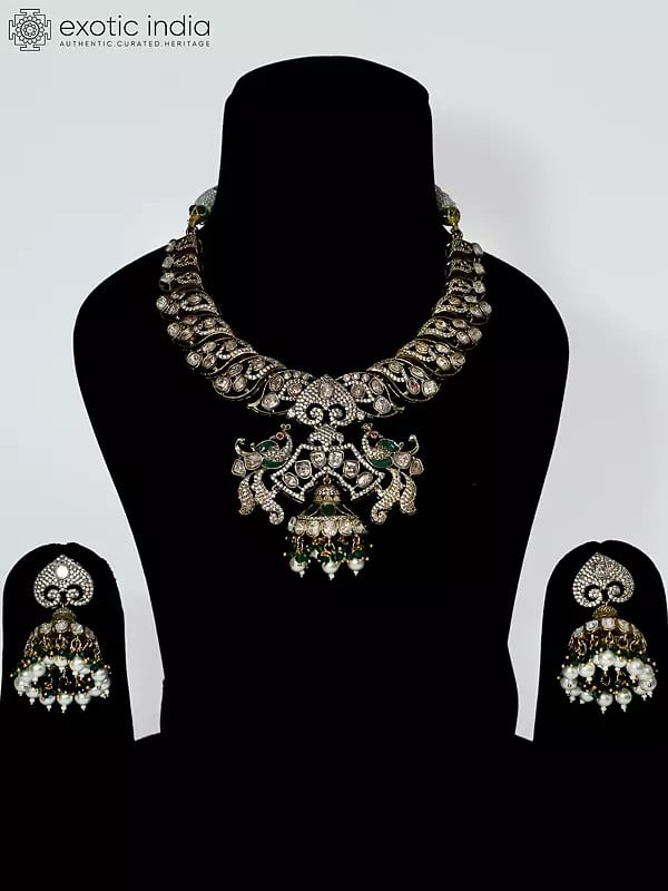 exotic india Peacock Design Embellished And Beaded Copper And Kundan Necklace Set With Earrings 
