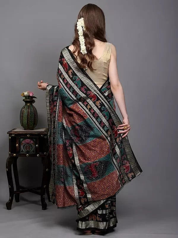 Exotic India Pirate-Black Pure Silk Ikat Handloom Sambhalpuri Saree With Animals-Birds Motifs And Woven Fish Border 