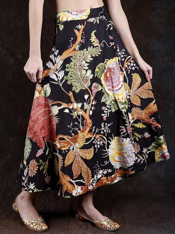 Exotic India Pirate-Black Wrap Around Long Skirt With Printed Foliage 
