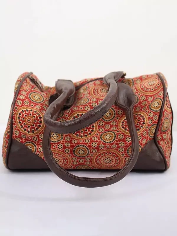 Exotic India Pompeian-Red Printed Cotton Duffle Bags With Sunglasses Hand Case 