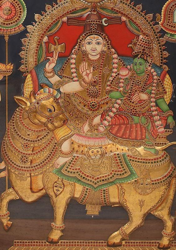 Exotic India Pradosha Moorthy (Shiva - Parvati) | Embossed Tanjore Painting | Traditional Colors With 24 Karat Gold | With Frame