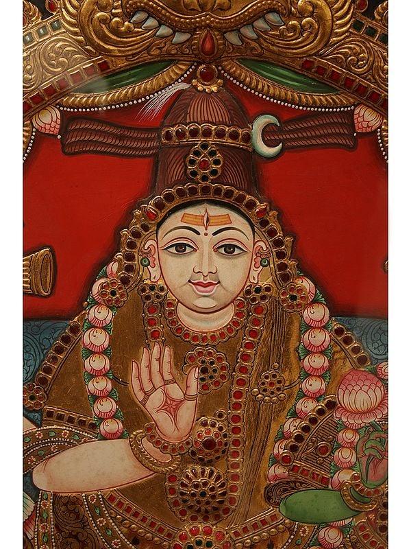 Exotic India Pradosha Moorthy (Shiva - Parvati) | Embossed Tanjore Painting | Traditional Colors With 24 Karat Gold | With Frame
