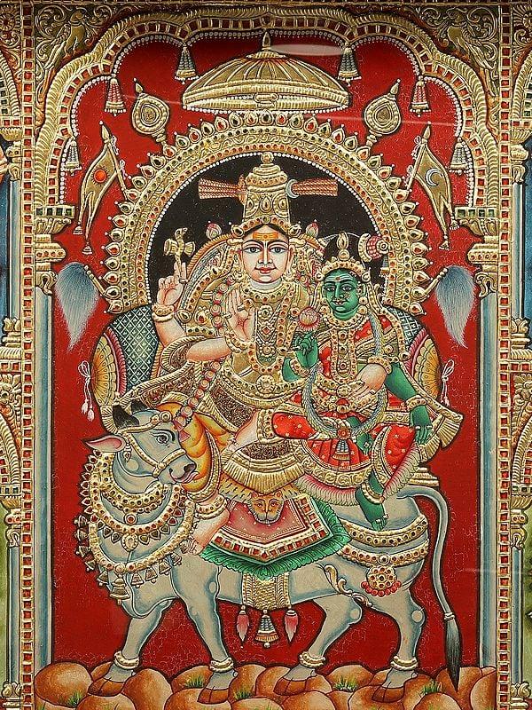 Exotic India Pradosha Moorthy (Shiva Parvati) | Tanjore Painting | With Vintage Teakwood Frame 