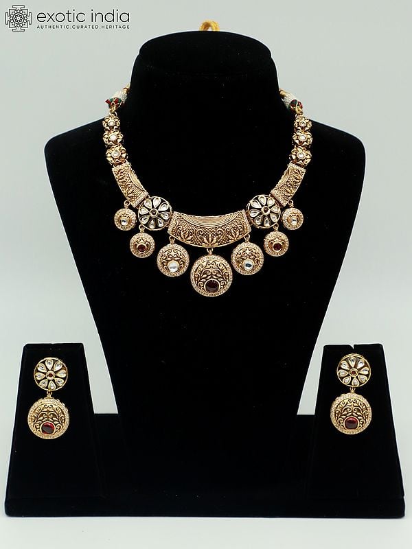 exotic india Premium Brass Necklace Set With Attractive Carving Earrings In Hasli Look 