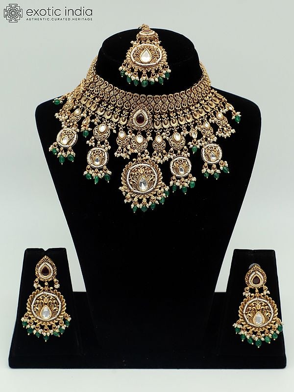 exotic india Premium Matte Designer Carving Necklace Set With Beautiful Earrings And Mangtika 