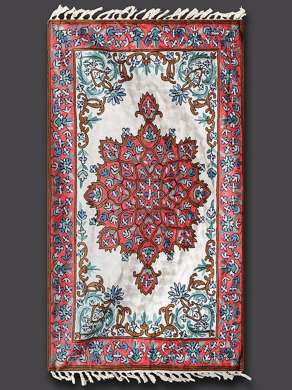 exotic india Pure White Rug with Peachy Red Border Silk Thread Chain Stitched Embroidered Carpet with Tassels and Traditional Motifs from Kashmir 