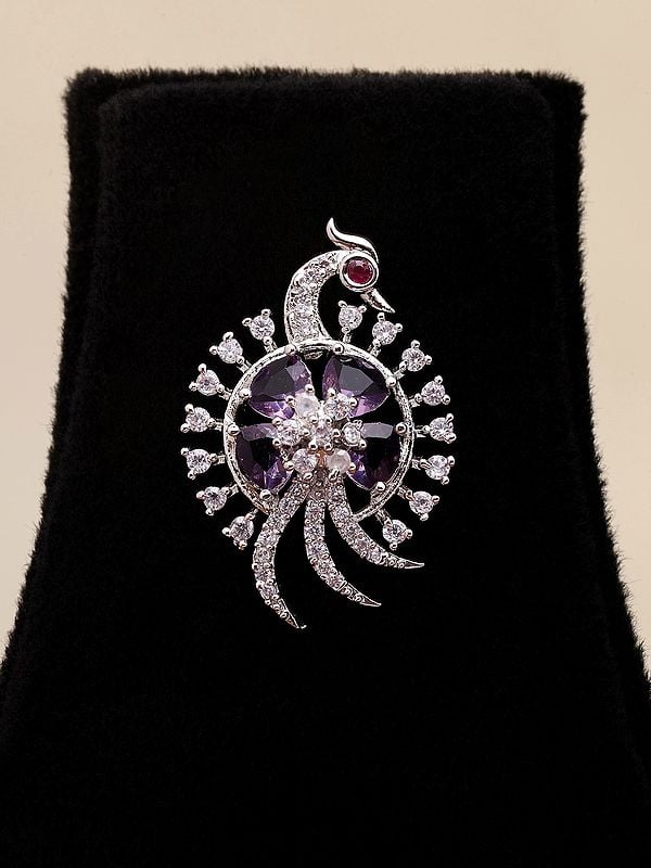 Exotic India Purple And White Stone Studded Peacock Pendant Set With Earrings