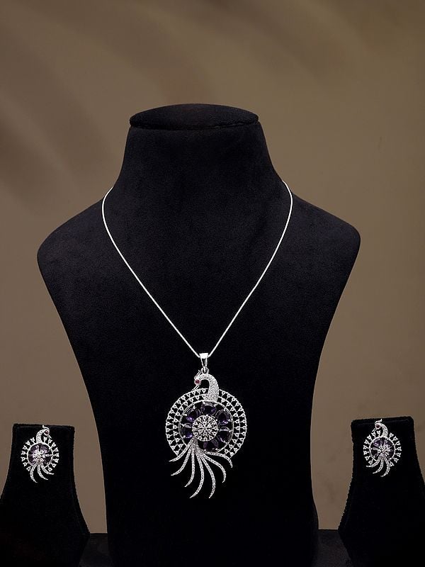 exotic india Purple and White Stone Studded Peacock Pendant Set with Earrings 