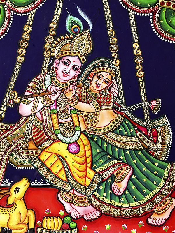 Exotic India Radha Krishna On Swing | 24 Karat Gold Work | Framed Tanjore Painting 