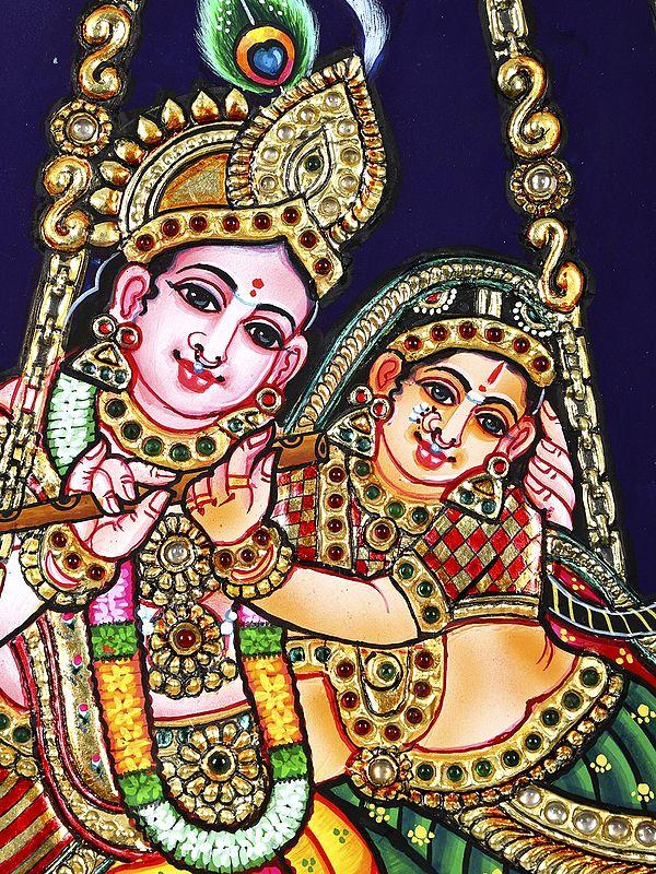 Exotic India Radha Krishna On Swing | 24 Karat Gold Work | Framed Tanjore Painting 