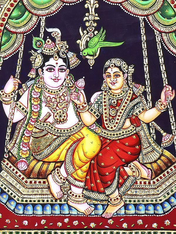 Exotic India Radha Krishna On Swing | 24 Karat Gold Work | Framed Tanjore Painting