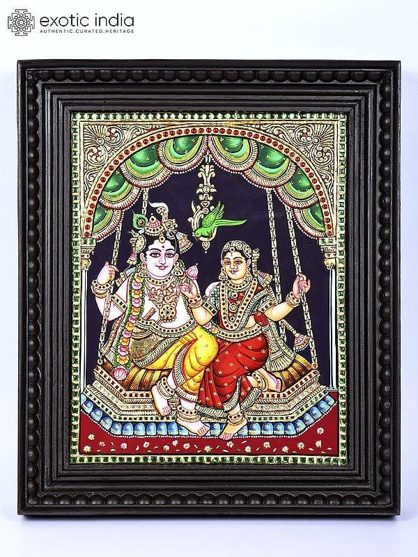exotic india Radha Krishna on Swing | 24 Karat Gold Work | Framed Tanjore Painting 