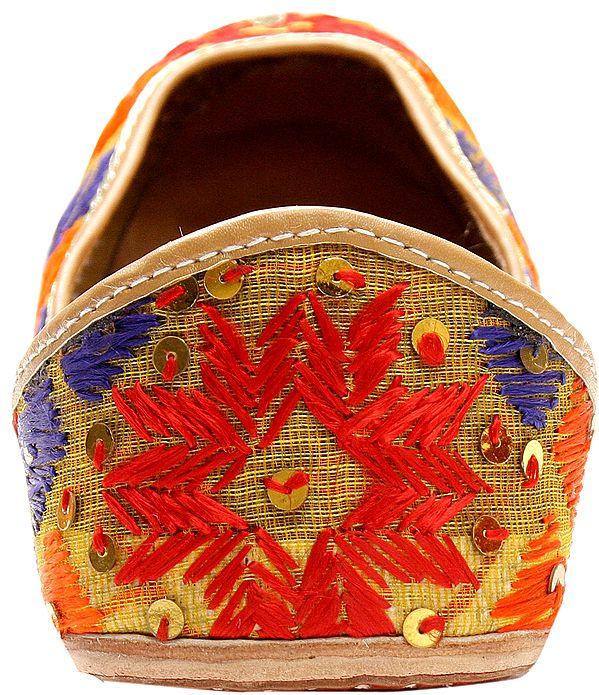 Exotic India Radiant Orange And Blue Jooti With Thread Embroidered Flowers And Sequins 