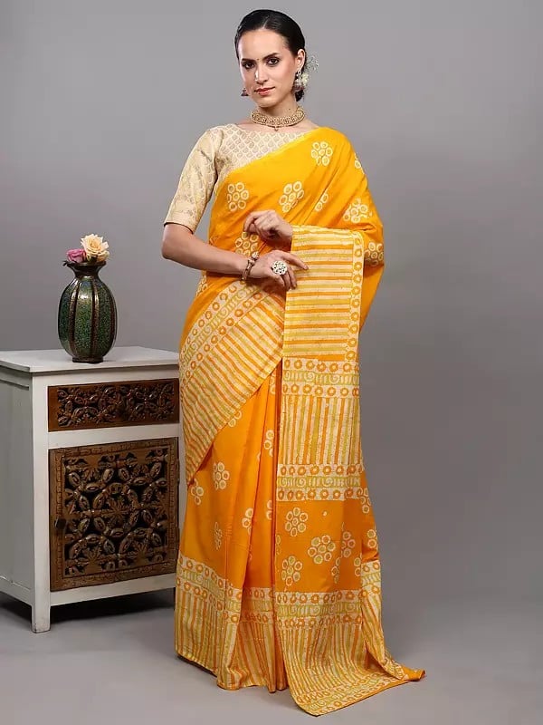 Exotic India Radiant-Yellow Batik Dyed Pure Cotton Saree With Printed Circle Motifs And Stripe Border From Gujarat 