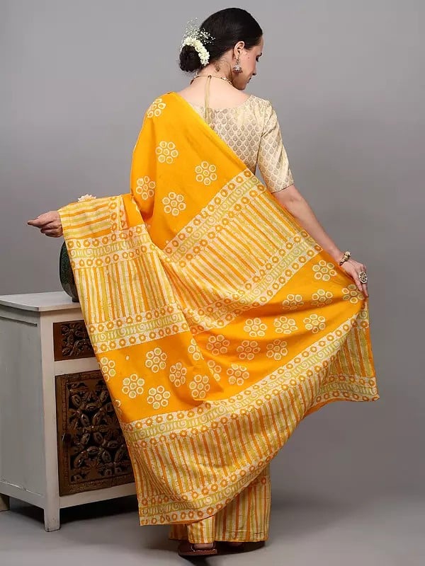 Exotic India Radiant-Yellow Batik Dyed Pure Cotton Saree With Printed Circle Motifs And Stripe Border From Gujarat 