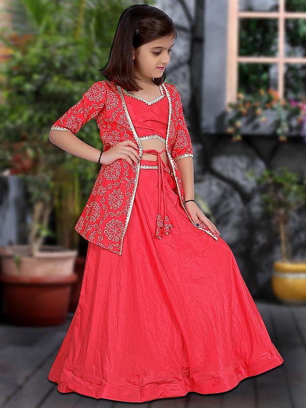 Exotic India Rani-Pink Heavy Silk Kid's Lehenga Choli With Rayon Patola Print Shrug 
