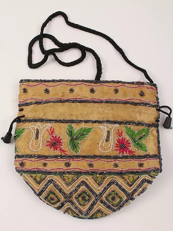 Exotic India Rattan-Beige Potli Bag With Beads Embroidery 