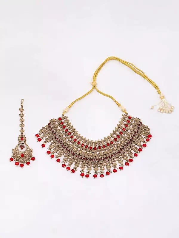 Exotic India Red And White Stone Studded Necklace Set With Earrings And Mangtika 