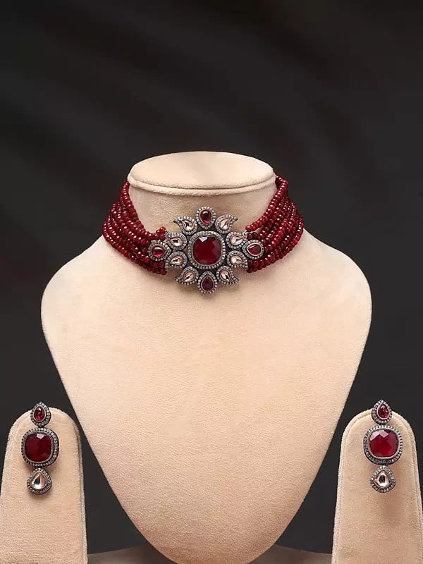 exotic india Red Stone Studded and Beaded Choker and Earrings Set 