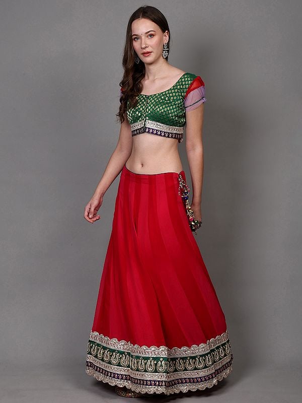 Exotic India Rethink-Pink Georgette Lehenga With Zari Brocaded Green Choli And Bead-Stone Embroidered Patch Border 
