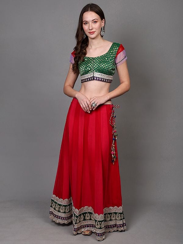exotic india Rethink-Pink Georgette Lehenga with Zari Brocaded Green Choli and Bead-Stone Embroidered Patch Border